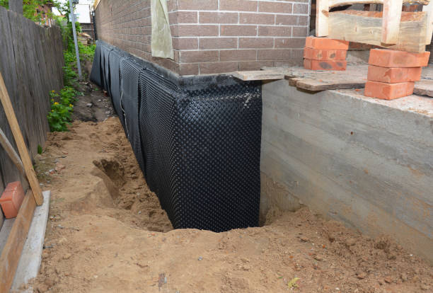 Happy homeowners after waterproofing job in Bristol